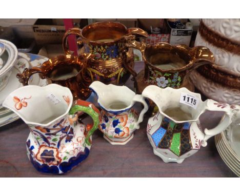 Three old "Gaudy Welsh" jugs - sold with three 19th Century copper lustre and enamel decorated jugs