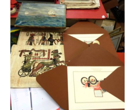 A collection of reproduction papyrus paintings - sold with two folios of vintage motor car prints, etc.