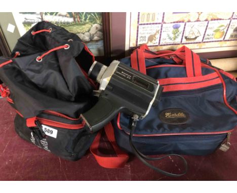 A vintage Polaroid 600 land camera and a Sankyo movie 25 Super cine camera - sold with two camera bags