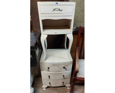 A vintage white painted bow front bedside chest and similar bedside table with drawer