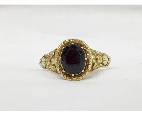 An unmarked late Georgian garnet ring with 1970 purchase invoice, size K.