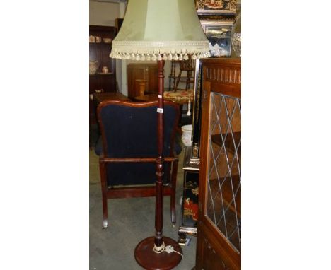 A standard lamp with shade.