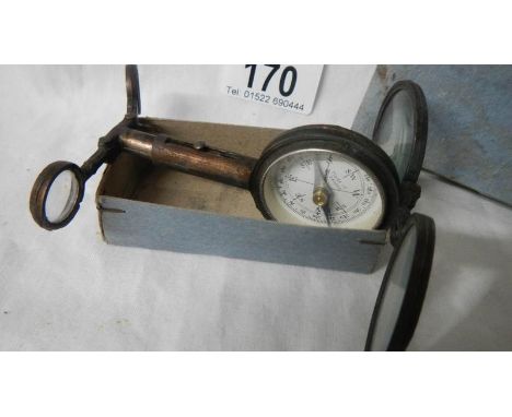 An original compass marked Depose' France, in original box.