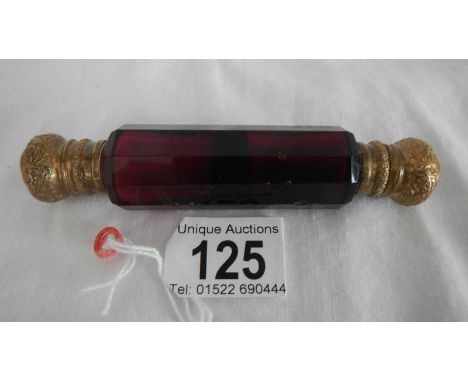 A ruby glass double ended scent bottle, one cap a/f.