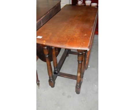 An oak gate leg table.