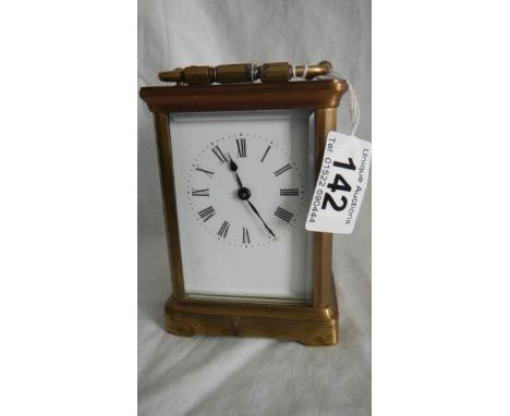 A mid 20th century brass carriage clock, not working and missing key.
