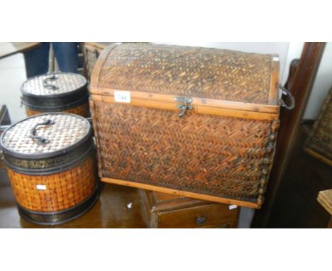 A wicker trunk and a wicker box.