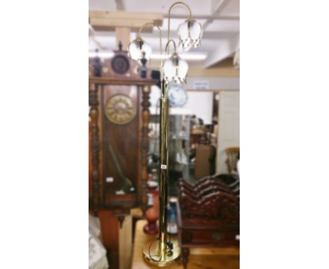 A modern 3 light standard lamp.