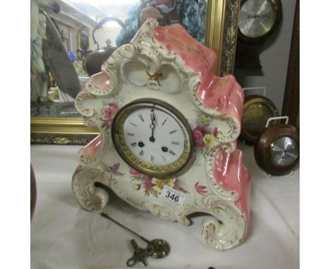 A ceramic mantel clock.