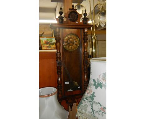 A mahogany Vienna wall clock.