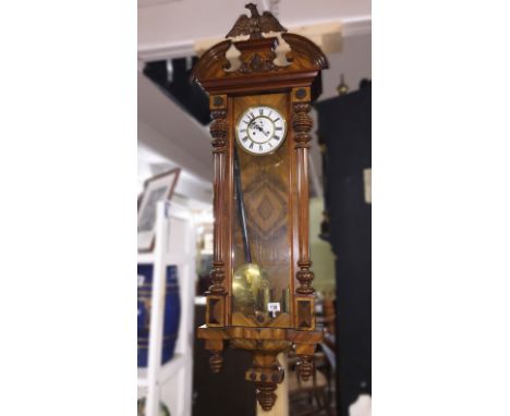 A Victorian mahogany twin weight Vienna wall clock.