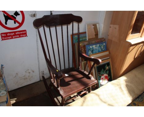 A stick back rocking chair