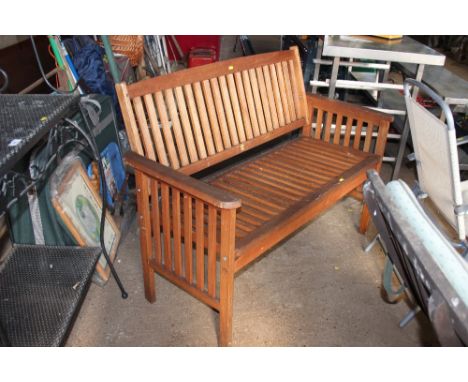 A teak garden bench