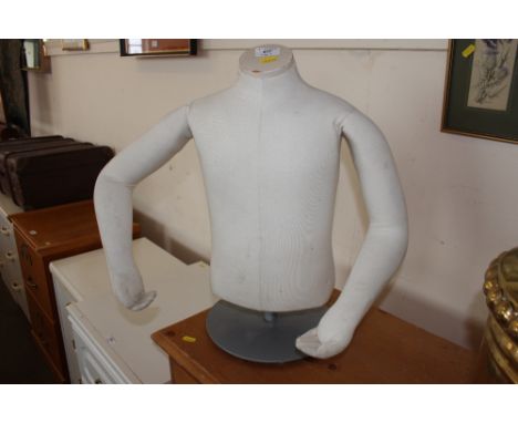 A child's mannequin torso 