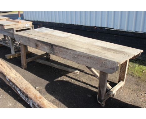 A large wooden work bench