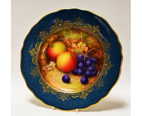 A ROYAL WORCESTER PLATE DECORATED WITH FRUIT BY RICHARD SEBRIGHT with mottled peacock-blue reserve to the wavy-edged border, 