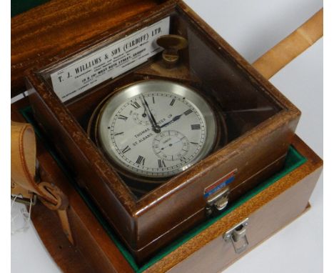 A THOMAS MERCER LTD NAUTICAL CHRONOMETER No.19800 bearing Roman numerals to the silvered dial and with two subsidiary dials, 
