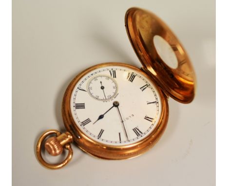 A 9CT GOLD ELGIN HALF-HUNTER POCKET-WATCH the case with machine turn decoration and with white enamel dial bearing Roman nume
