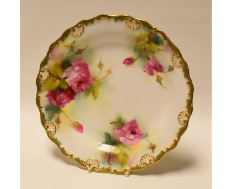 A ROYAL WORCESTER CABINET PLATE painted with three sprays of pink roses by S Pillsbury, signed, date mark for 1918, 23cms dia