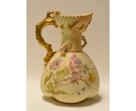 A ROYAL WORCESTER BLUSH IVORY TWIG-HANDLE JUG the neck of naturalist form and the body painted with wild-flowers, 21cms high