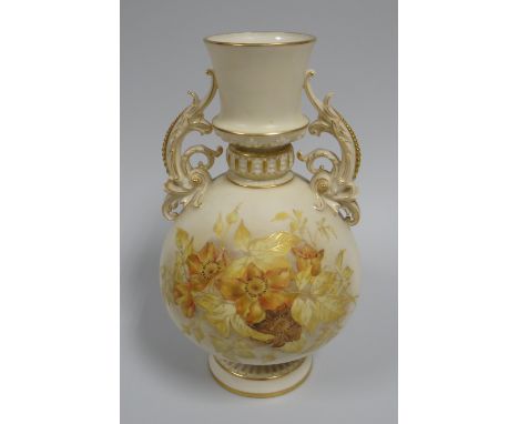 A ROYAL WORCESTER TWIN HANDLED VASE raised on a circular base, with tapered neck to the ovoid body and with elaborate natural