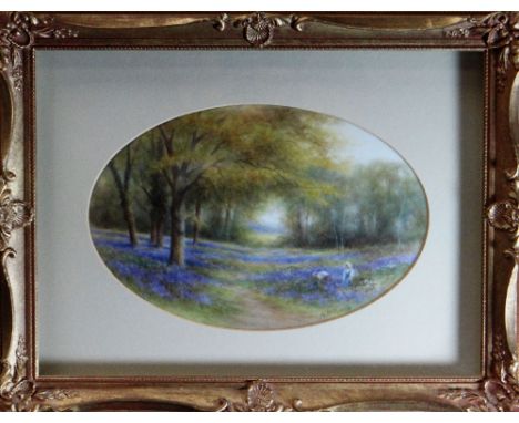 A FRAMED OVAL ROYAL WORCESTER PLAQUE of concave form, painted with two figures picking flowers in a woodland by Milwyn Hollow