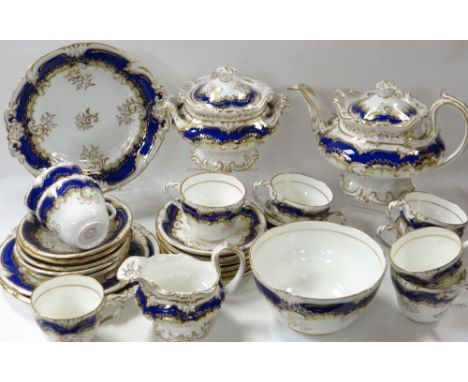 A VICTORIAN TWENTY-EIGHT PIECE GRAINGER WORCESTER TEA-SERVICE  in elaborate blue and gilt decoration and of moulded form
