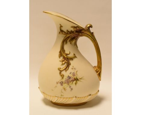 A ROYAL WORCESTER BLUSH IVORY JUG with gilded naturalistic handle and painted with wild-flowers, 18.5cms high