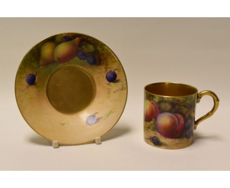 A ROYAL WORCESTER COFFEE-CAN & SAUCER decorated with fruit by W H Austin, date mark for 1923