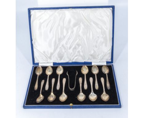 A cased set of silver coffee spoons and tongs, marks for Sheffield 1955 and 1957, makers mark EV