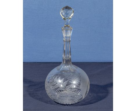 An etched glass wine decanter