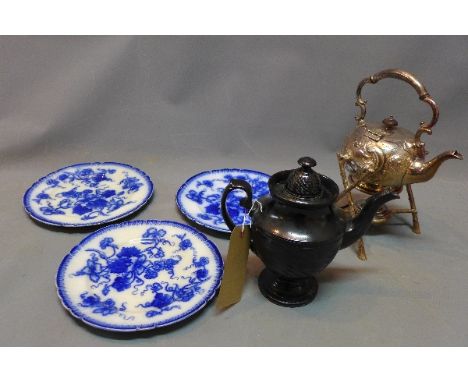 A plated teapot on naturalistic stand with paraffin lamp, together with a black Cyples ceramic teapot, and three blue and whi