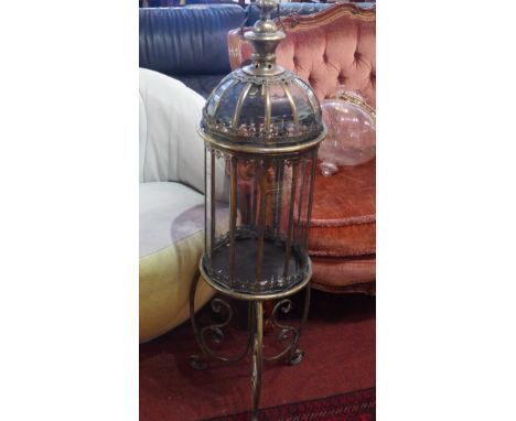 A large gilt metal storm lantern on stand. 