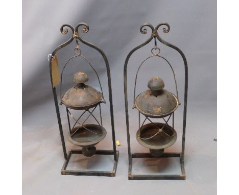 A pair of Storm lantern