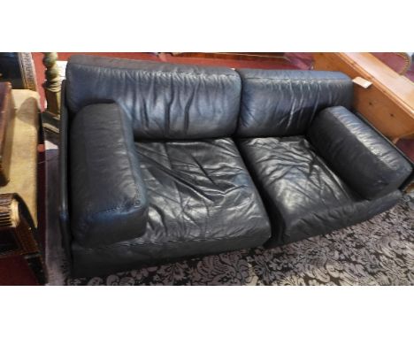 A black leather two seater sofa. 