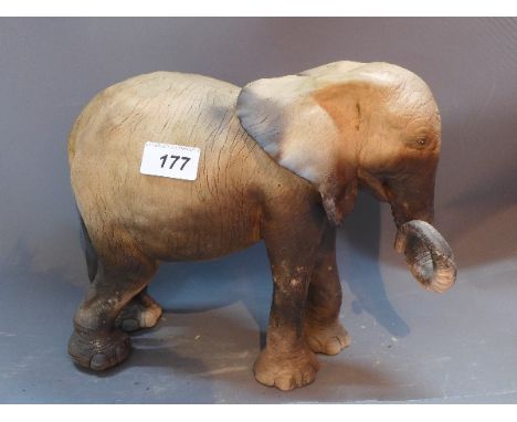 A ceramic elephant, L:30cm