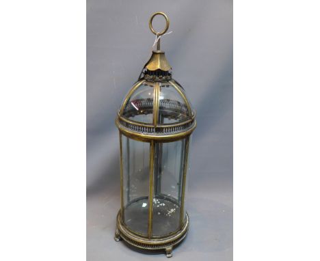 A large gilt metal storm lantern. H-78cm 