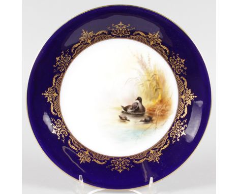 A ROYAL WORCESTER PLATE, unusually painted with Coots by George Johnson, signed, date code for 1918.