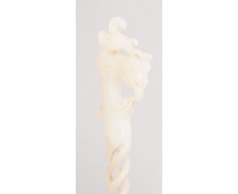 A GOOD 19TH/20TH CENTURY WHITE JADE HAIR ORNAMENT, with pierced triple twist stem, the top carved in the form of a dragon's h