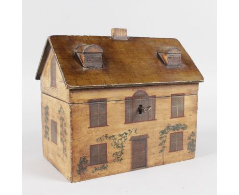 A GEORGIAN PAINTED WOOD TEA CADDY, the roof with two dormer windows, two division tea caddy, the front with door, five window