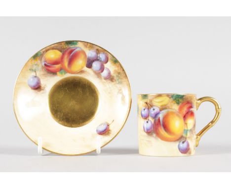 A ROYAL WORCESTER FRUIT PAINTED COFFEE CAN AND SAUCER, both signed by Roberts black mark.
