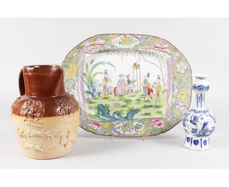 A 19TH CENTURY DERBYSHIRE POTTERY TREACLE GLAZE HUNTING JUG, a Masons Oriental style platter and pottery water bottle painted