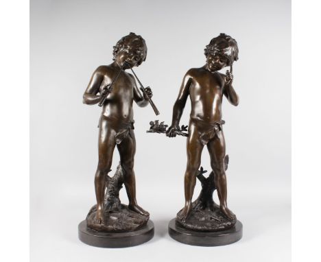 AUGUSTE MOREAU (19TH CENTURY) FRENCH A SUPERB PAIR OF BRONZES OF YOUNG BOYS, one playing two pipes, the other holding two bir