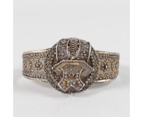A VICTORIAN SILVER FILIGREE BANGLE.