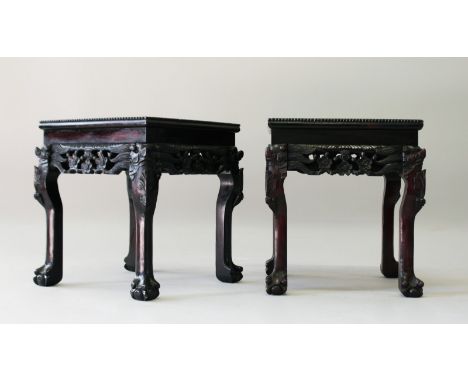 A GOOD PAIR OF CHINESE SQUARE PLANT-VASE STAND with inset hardstone top, carved edge on curving legs with claw feet. 16ins wi