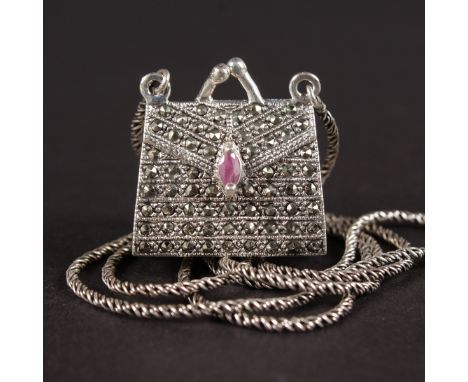 A SILVER MARCASITE AND RUBY LOCKET BAG AND NECKLACE.