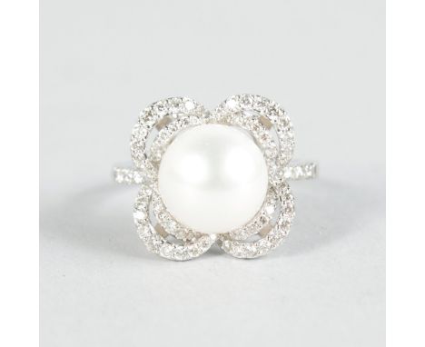 A LOVELY PEARL AND DIAMOND RING set in 18ct white gold.