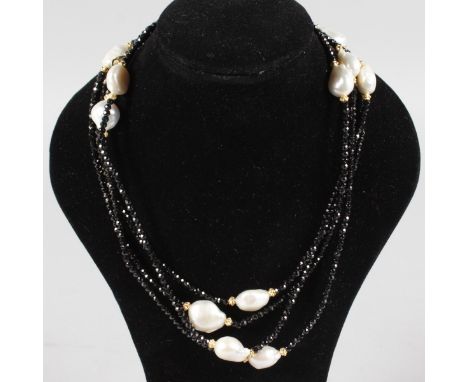 A BLACK GARNET AND FRESHWATER PEARL NECKLACE.
