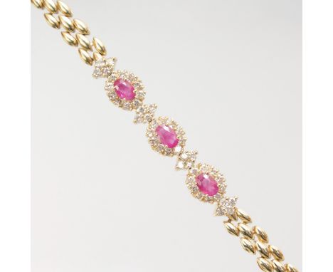 AN 18CT YELLOW GOLD, RUBY AND DIAMOND BRACELET.