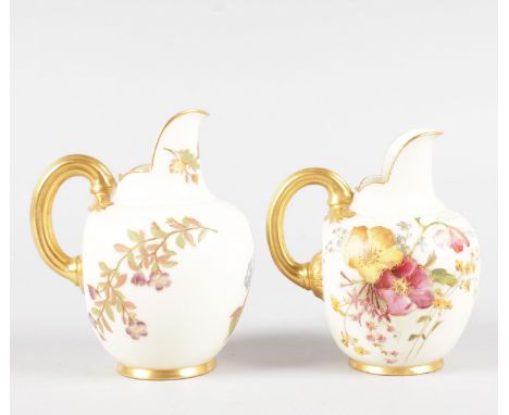 TWO ROYAL WORCESTER JUGS, painted with flower on a blush ivory ground, date code for 1907 & 1891.